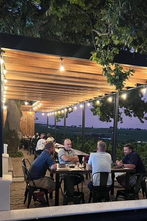 Outdoor terrace dining at night