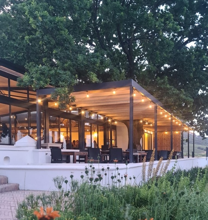 Blacksmith's Kitchen exterior at dusk with fairy lights